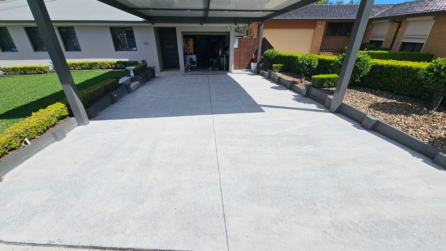 Quartz broadcast applied to first driveway during installation