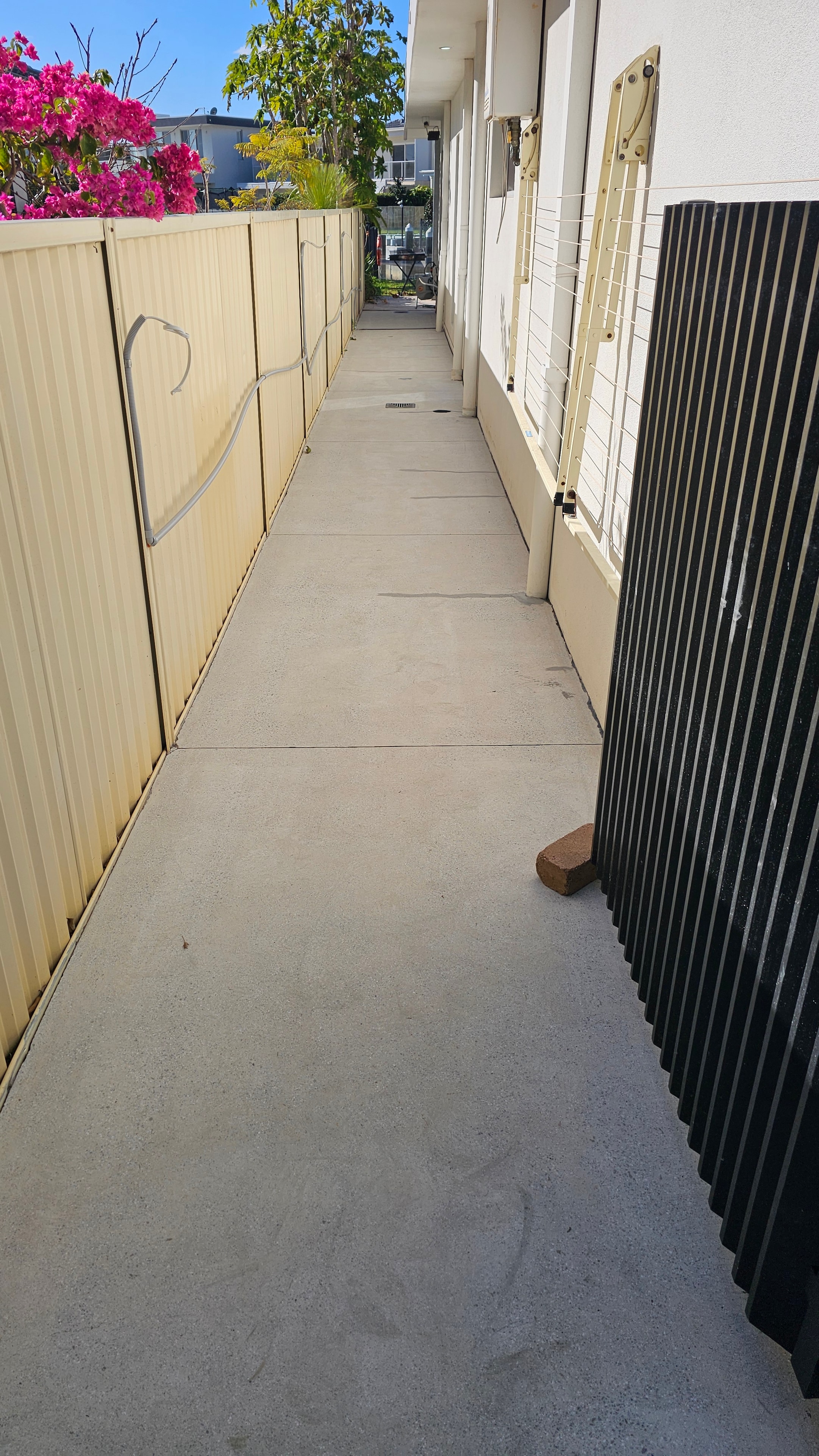 Concrete retaining wall after grinding and preparation