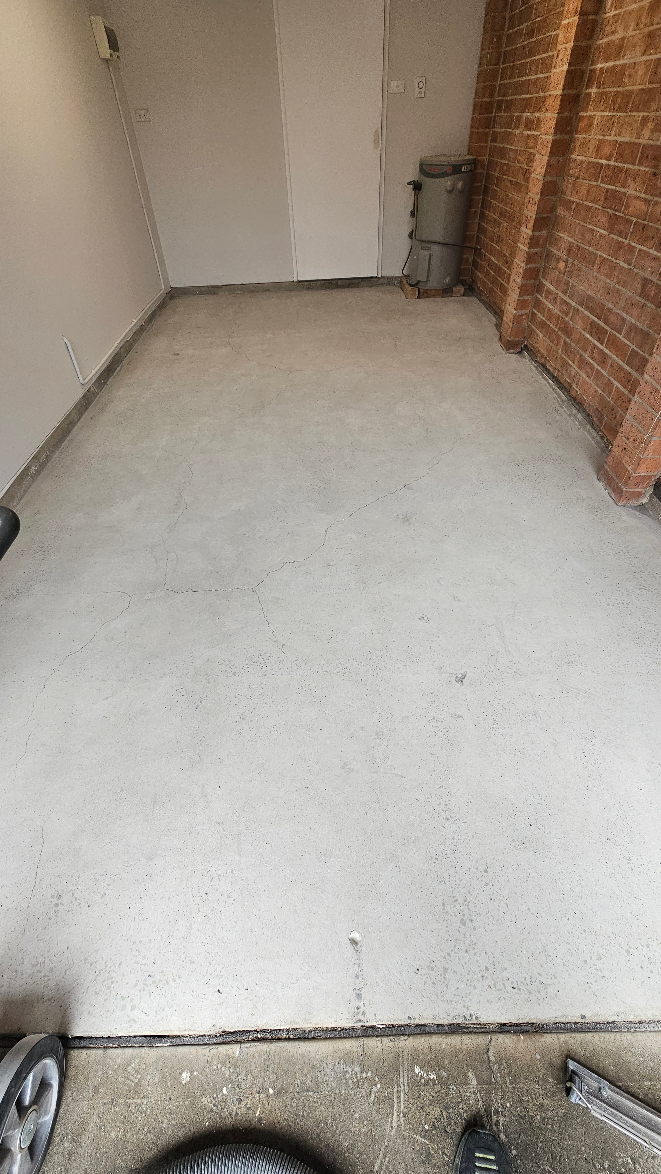 Concrete garage interior before surface preparation